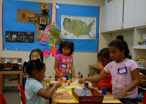 Applicant children playing during a workshop for their families